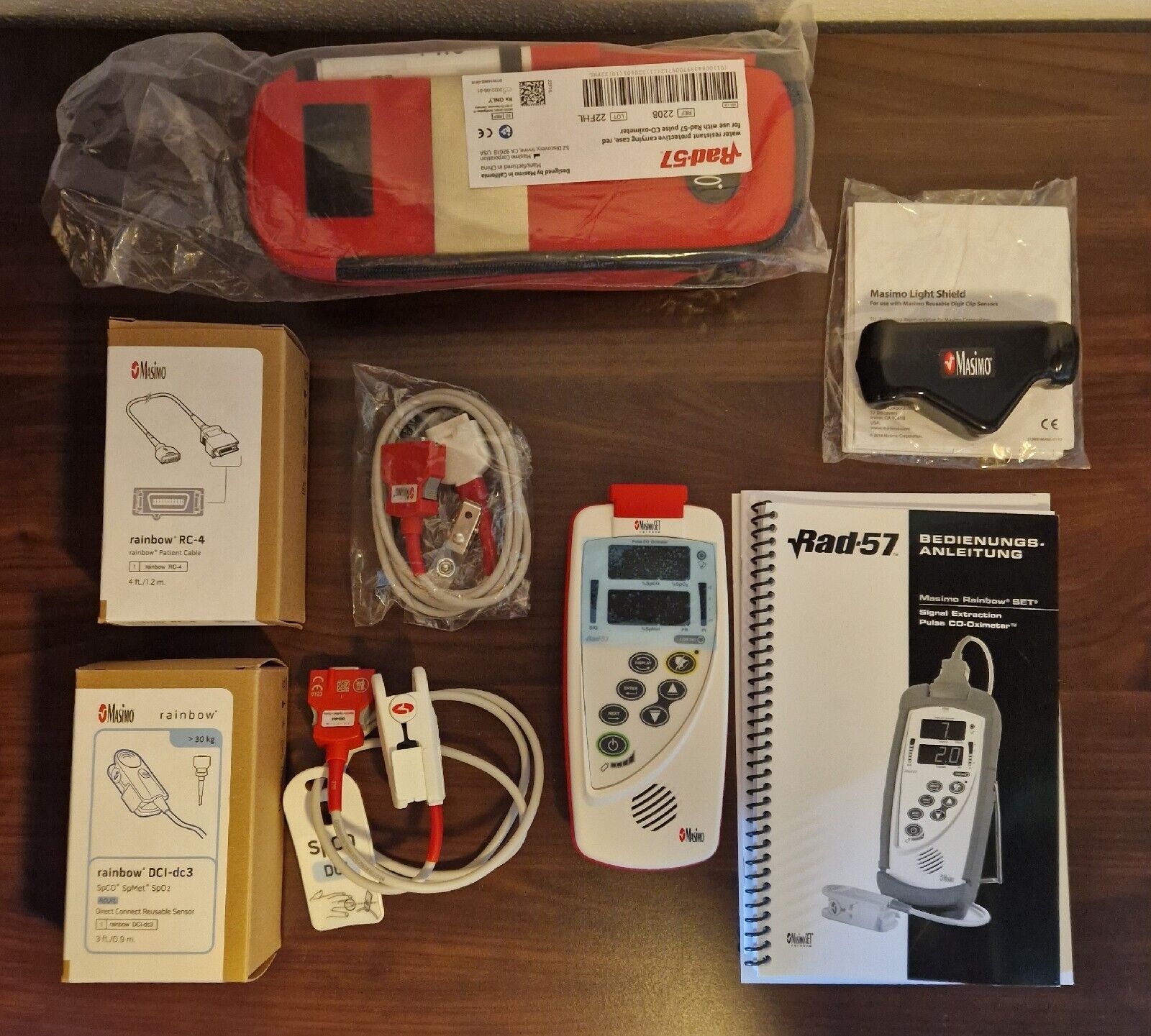 Masimo Rad-57 (SPO2, SPCO und SpMet) + Sensor, Kabeln, Hand-