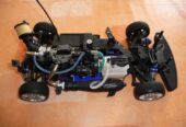 OS Engine FS 26 S-CX mit Kyosho FW05T Fahrzeug