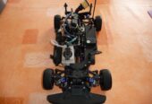 OS Engine FS 26 S-CX mit Kyosho FW05T Fahrzeug