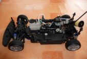 OS Engine FS 26 S-CX mit Kyosho FW05T Fahrzeug